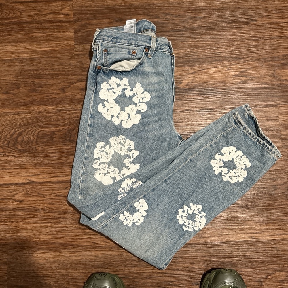 Men Blue Jeans with White Floral Design